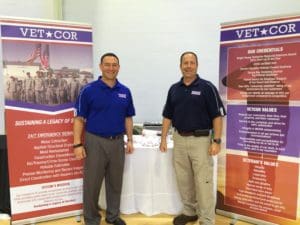 CEO and COO at trade show scaled