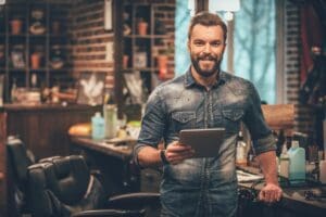 Keeping,Business,On,Top,With,Digital,Technologies.,Cheerful,Young,Bearded