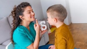 Speech,Therapist,And,Little,Patient,Training,Articulation.,Speech,Therapist,Teaches