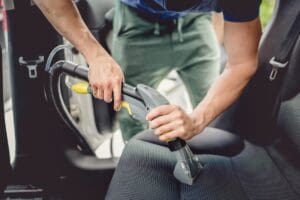 Details,Of,Car,Cleaning, ,Male,Using,Professional,Steam,Vacuum