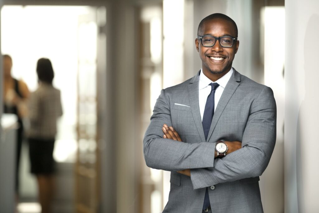 Handsome,Cheerful,African,American,Executive,Business,Man,At,The,Workspace