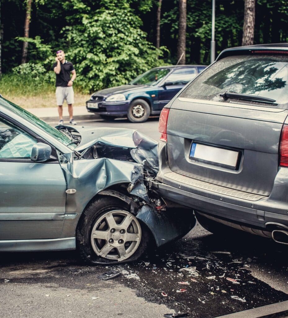 Close up smached cars on a road.