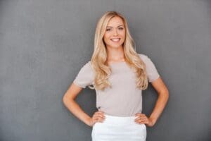 Confident,In,Her,Abilities.,Smiling,Young,Blond,Hair,Woman,Holding