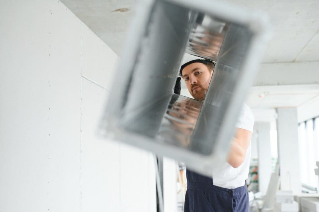 Industrial,Theme.,Warehouse,Heating,And,Cooling,System,Installation,By,Professional