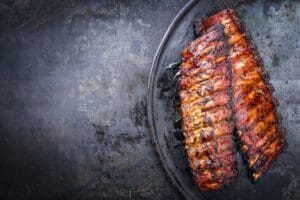 Barbecue,Pork,Spare,Ribs,As,Top,View,On,An,Old