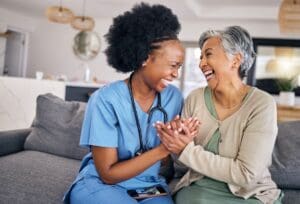 Smile,,Funny,And,Assisted,Living,Caregiver,With,An,Old,Woman